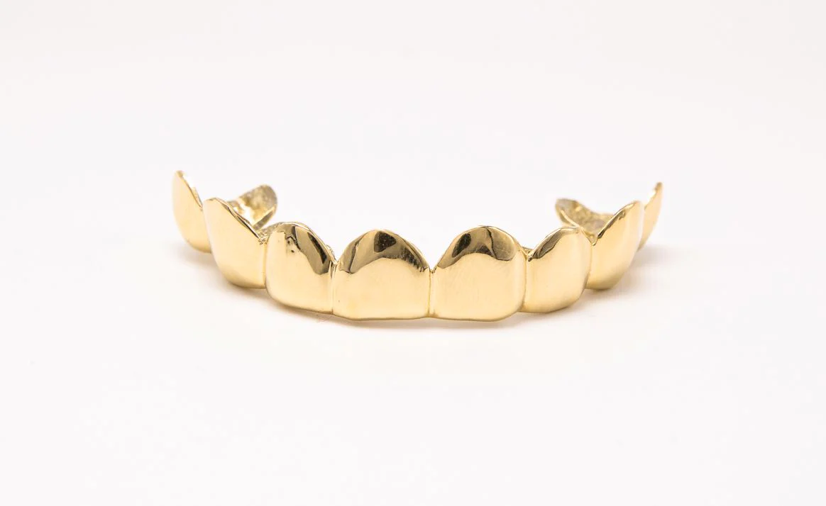 A Staple In The Grillz Game. These Top or Bottom Eight Gold Grillz Shine Bright. 