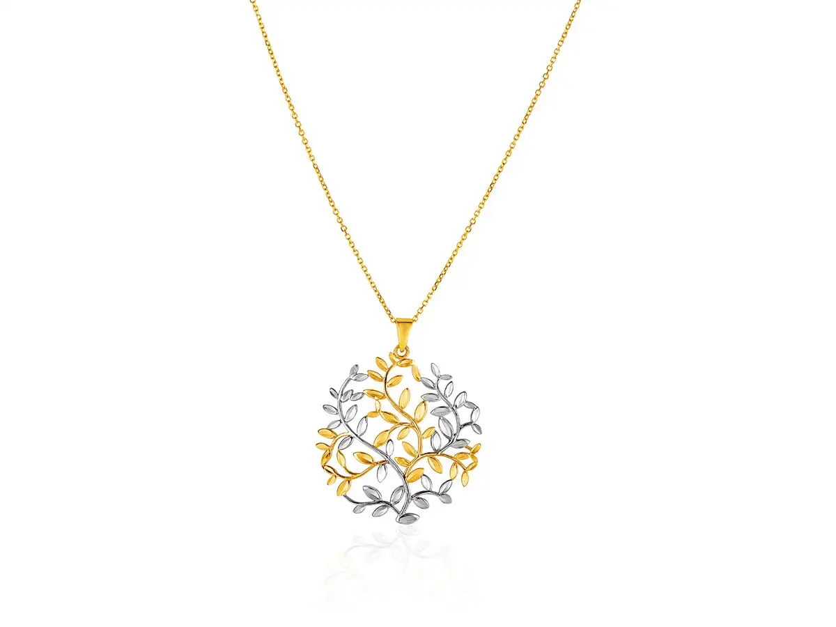 A classic textured Tree of Life motif hangs from a simple gold chain.