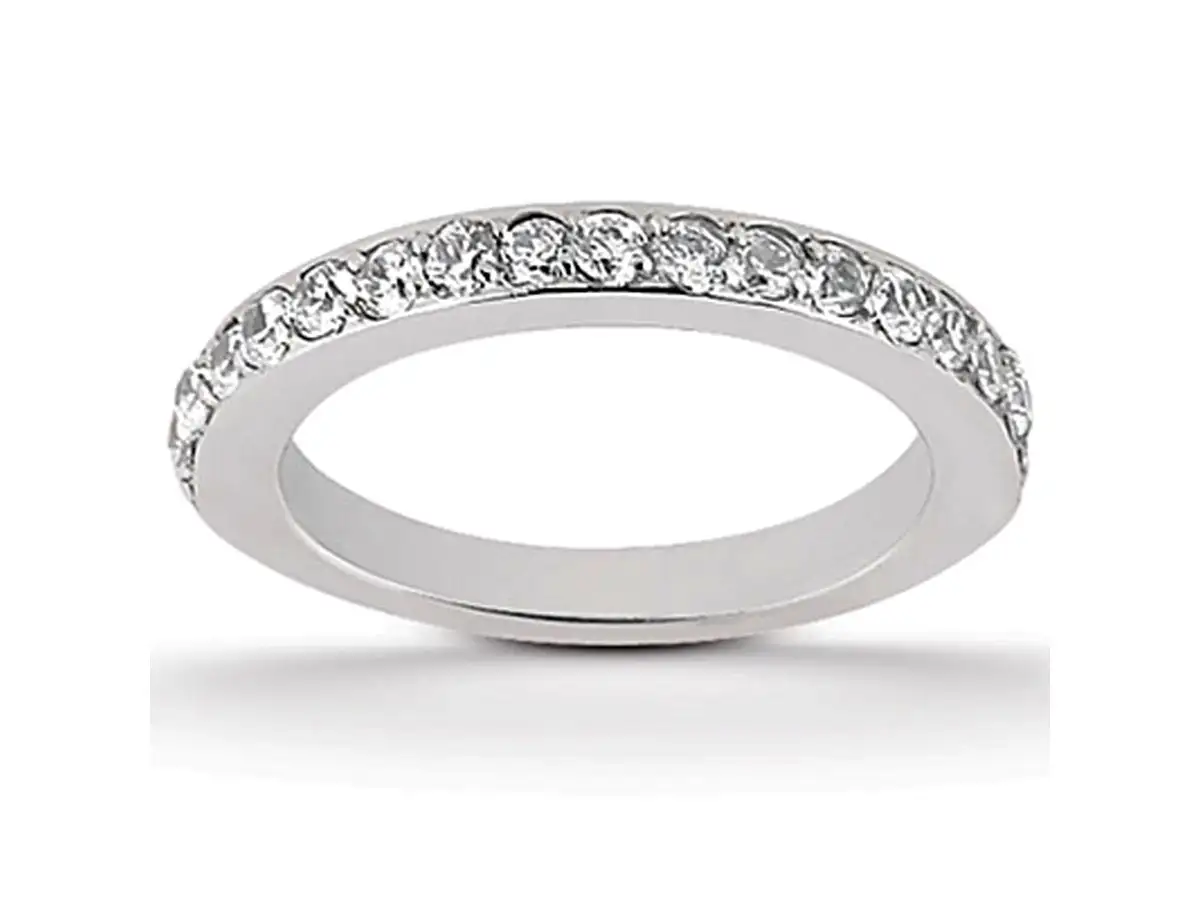 Glittering pave diamonds enliven the wide band of this expertly crafted 14k white gold wedding ring. Featuring a row of pave
               diamonds that extends half way across the band, the ring makes a bold statement and is suited to those with an active lifestyle.